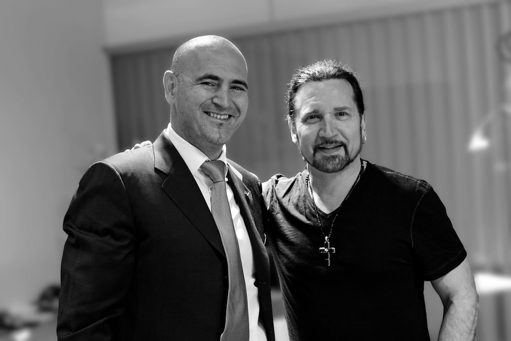 Marc A. Hayek, Eric Singer