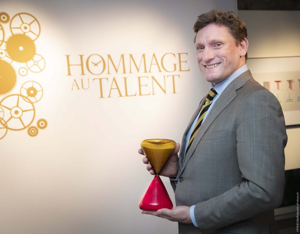 Greubel Forsey's Stephen Forsey accepts the Homage au Talent award given by the FHH.