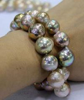 Freshwater pearls out of China are large  and   lustrous . 