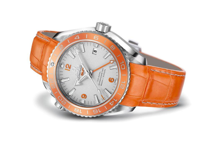 The orange ceramic bezel features LiquidMetal(R) platinum numerals, divisions and ring. 