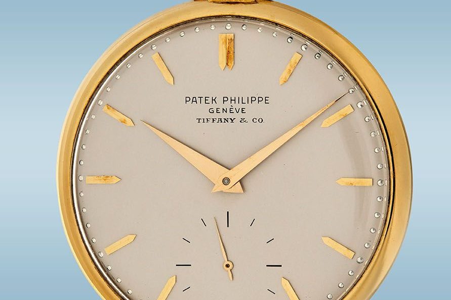 Lot 7 — PATEK PHILIPPE, Reference 715, open-face pocket watch retailed by Tiffany & Co., 18K yellow gold, circa 1967. Donated by Collectability. • Lot 7 — PATEK PHILIPPE, Reference 715, open-face pocket watch retailed by Tiffany & Co., 18K yellow gold, circa 1967. Donated by Collectability.