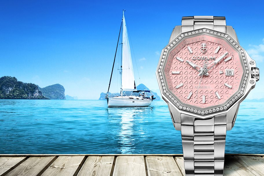 A082_04242 1a Corum Admiral 38 Automatic watch with pink dial and strap.