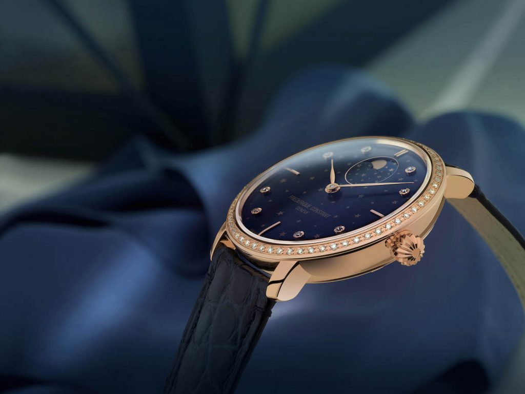 This Frederique Constant Slimline Moonphase Stars Manufacture watch is crafted in rose glottal case with a midnight blue dial with star motif. 