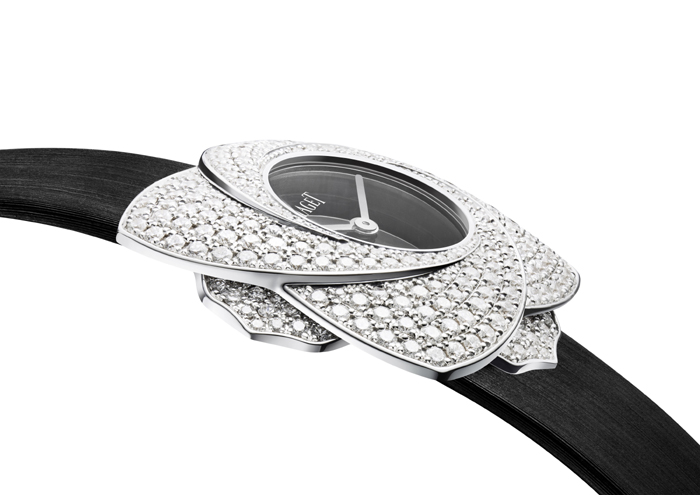 The watch case "blooms" with a turn -- magically blossoming for day-to-night wear. 