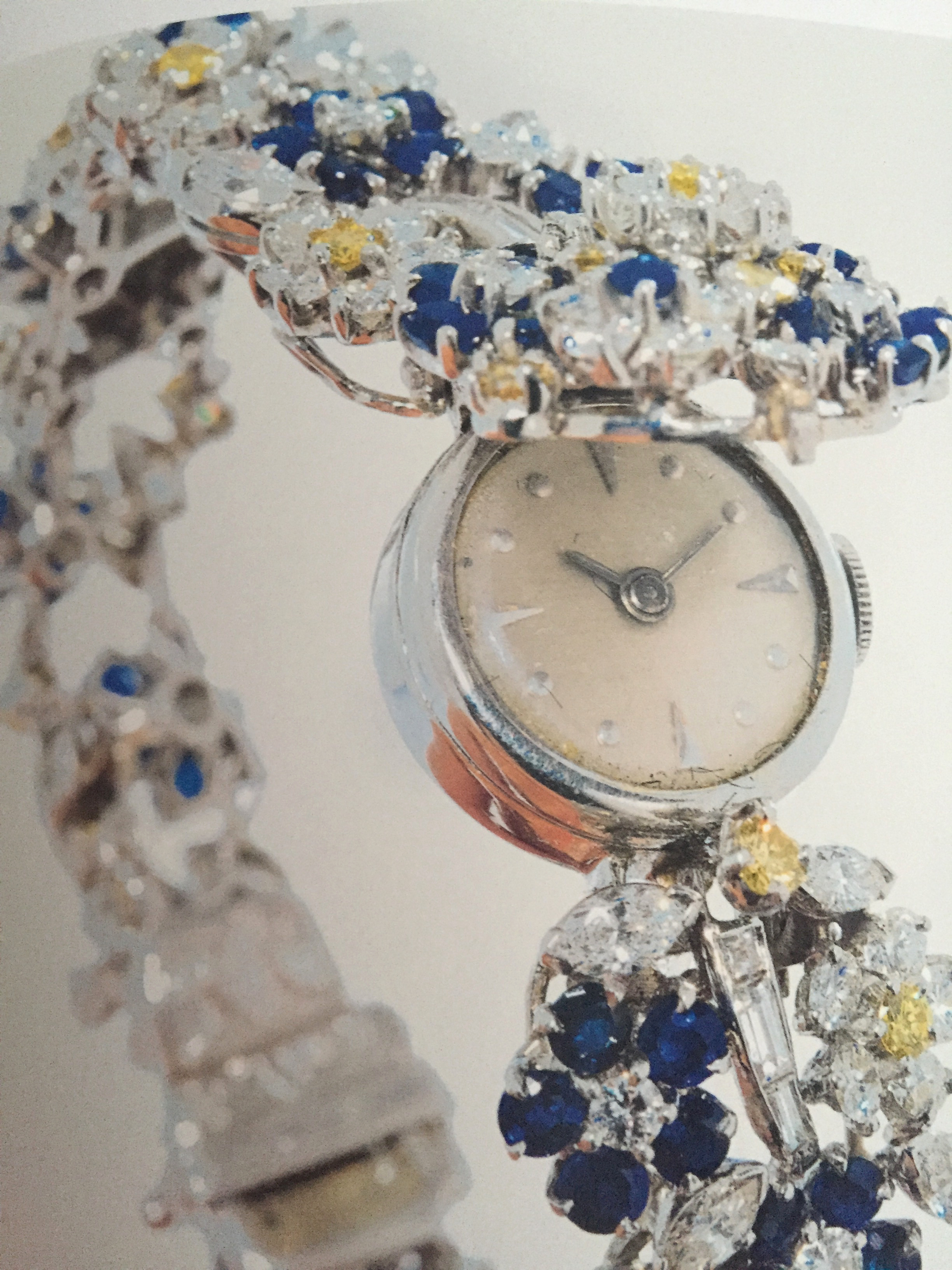 Diamond and gemstone secret watch made by Oscar Heyman. 