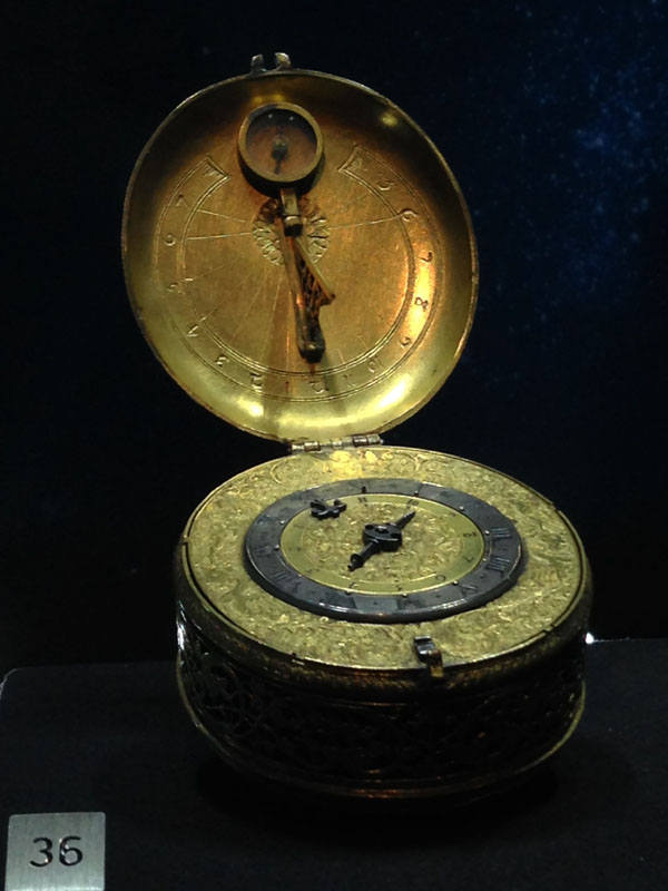 Pendant alarm watch circa 1590 in the form of a sundial with compass for setting time