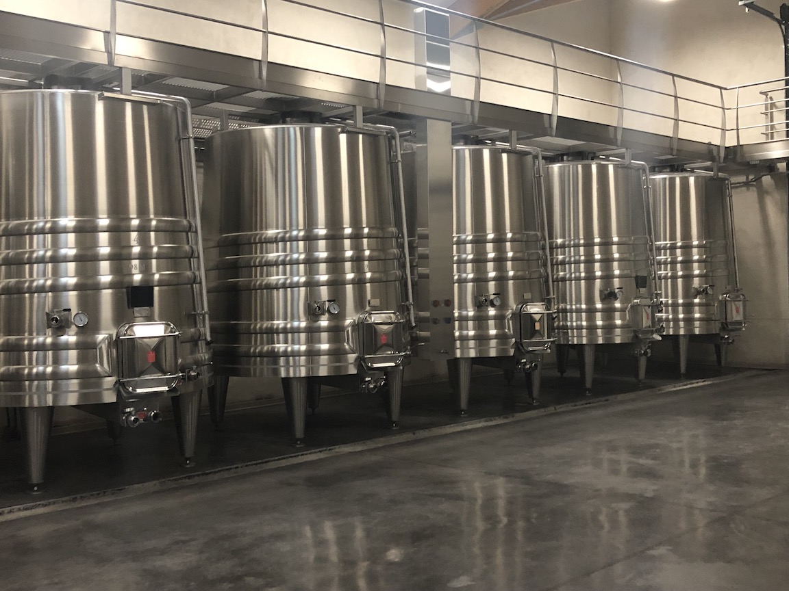 Stainless steel wine vats at Chateau Monestier La Tour