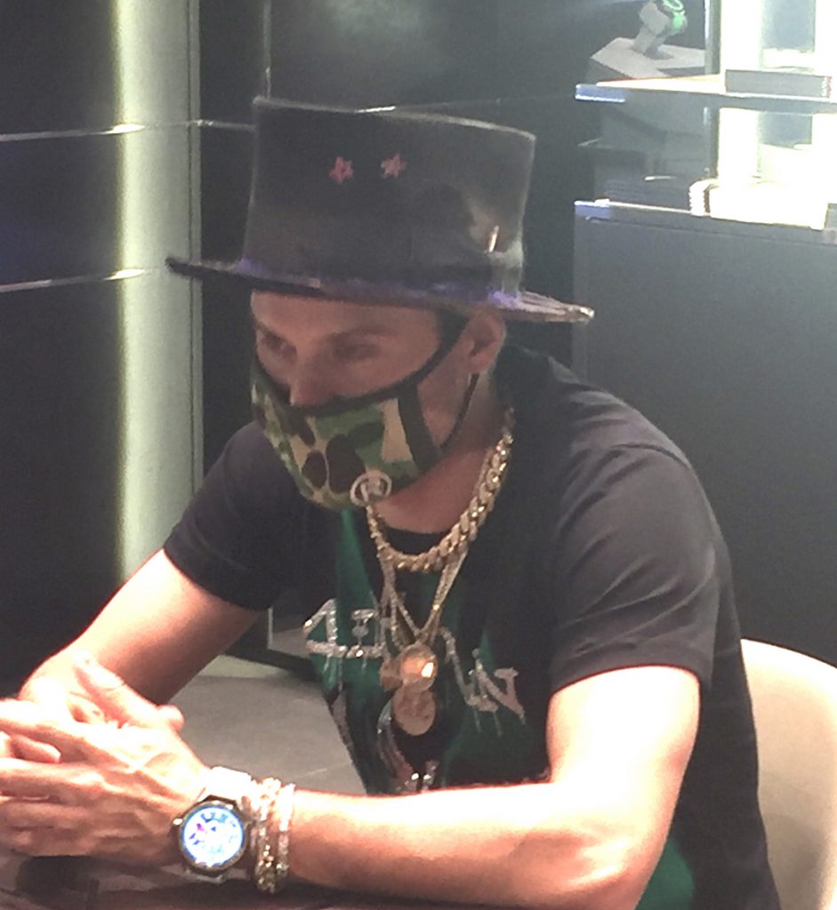 Alec Monopoly is a brand ambassador (Artist provocateur) for TAG Heuer. 