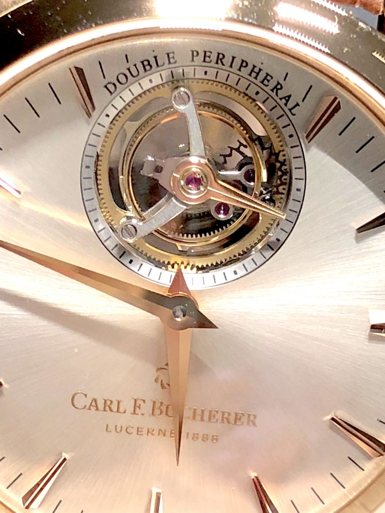 The tourbillon escapement of the Carl F. Bucherer Manero Tourbillon DoublePeripheral watch is peripherally mounted and can be viewed from the dial side and reverse side. 