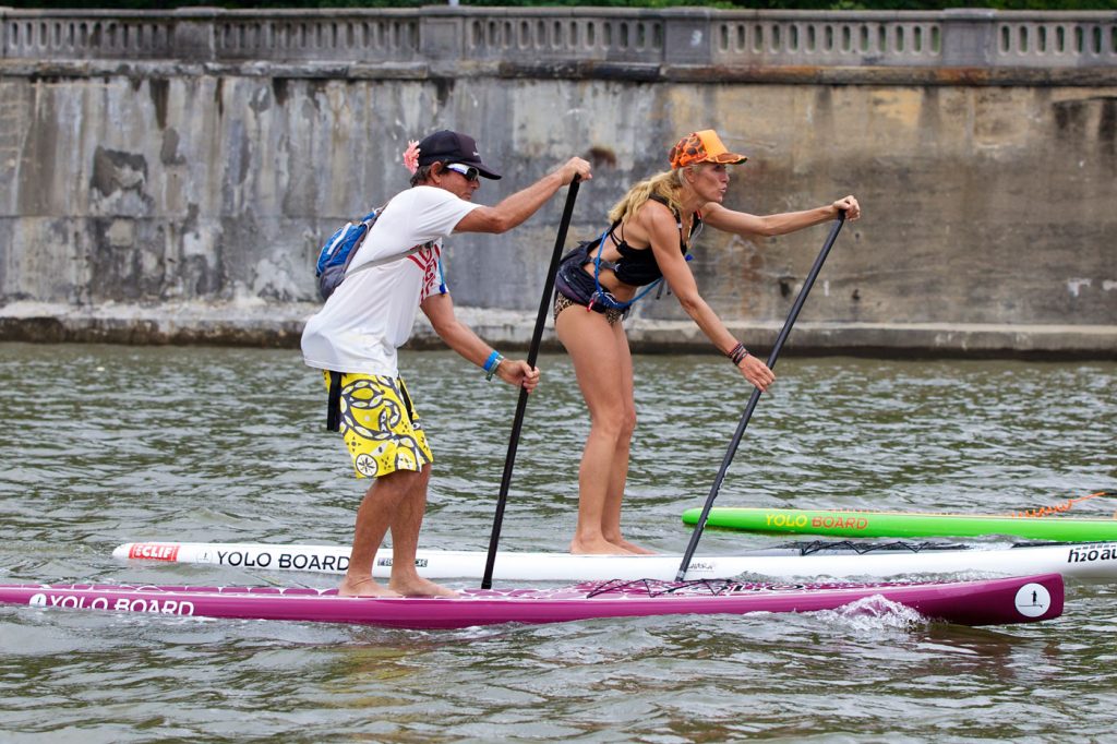 Hundreds of paddlers participate in the charity auction. 