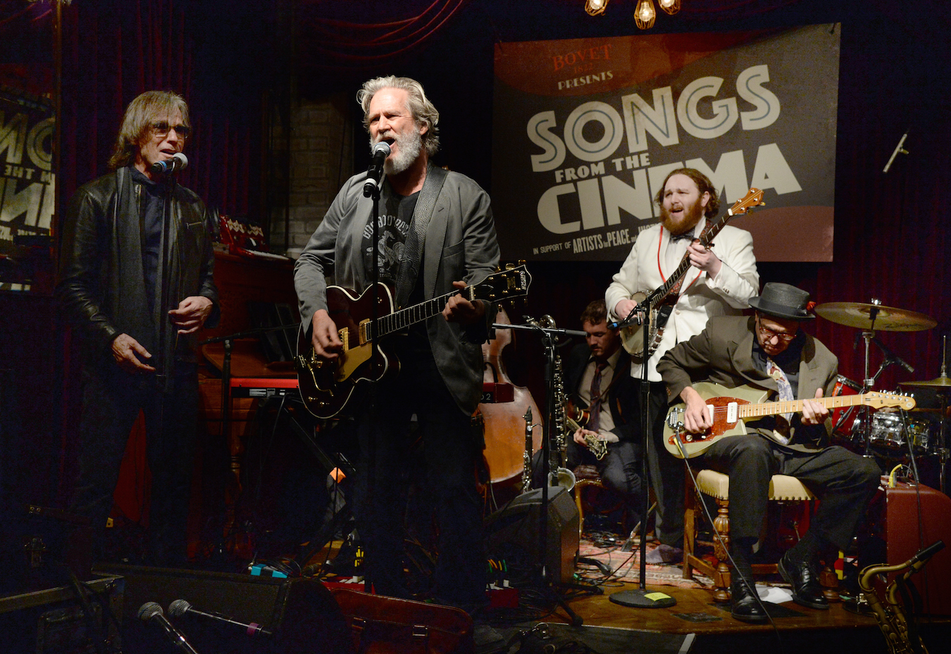 Singer-songwriter Jackson Browne and actor Jeff Bridges perform onstage during BOVET 1822 & Artists for Peace and Justice Present "Songs From the Cinema" Benefit on February 23, 2017 in Los Angeles, California. (Photo by Michael Kovac/Getty Images for Artists for Peace and Justice)