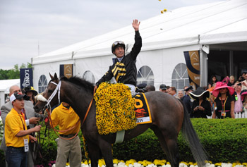 Jockey Gary Stevens on Oxbow celebrates. (photo: Diane Bondareff/Invision for Longines/AP Images)