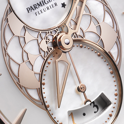 TECHNICAL DETAILS REFERENCES MOVEMENT PFC283-1063300 PF318 Winding: Self-winding Power reserve: 50 hours Frequency: 4 Hz – 28,800 Vib/h Dimensions: 11 1⁄2''' – Ø 26.0 mm Thickness: 4.7 mm Components: 205 Jewels: 28 Barrel(s): 2 series-coupled barrels Decoration: "Côtes de Genève" decoration, bevelled bridges FUNCTIONS Hours, Minutes Small seconds Date Moon phase CASE Shape: Round, in 3 sections Dimensions: Ø 33.72 mm Thickness: 9.57 mm Material: 18 ct rose gold Number of diamonds: 76 Carats: 0.5200 Water resistance: 30 m Case-back: Sapphire Crystal: Anti-reflective sapphire Crown: Ø 5.5 mm Engraving on case-back: Individual number DIAL Material: White mother of pearl Indices: 18 ct rose gold appliques Finish: Snailed exterior, rose gold lace centre, opaline counters Hands: Skeleton Delta-shaped STRAP Gold: 18 ct rose gold Leather: Calfskin or 18 ct rose gold bracelet BUCKLE Type: Folding