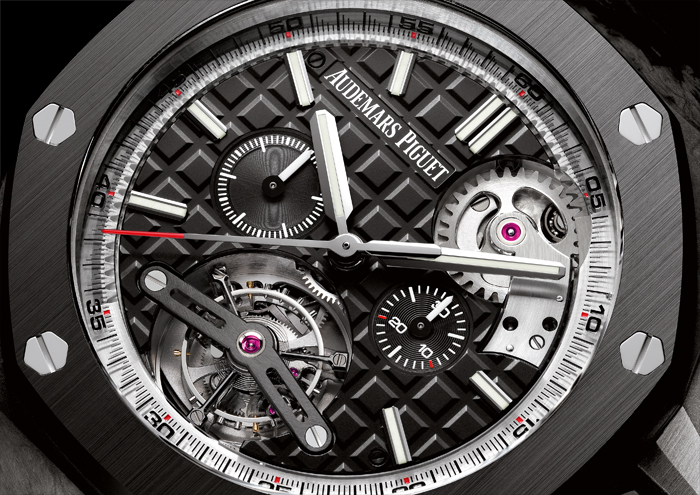 The tourbillon escapement is visible and is complemented by the Tapisserie dial.