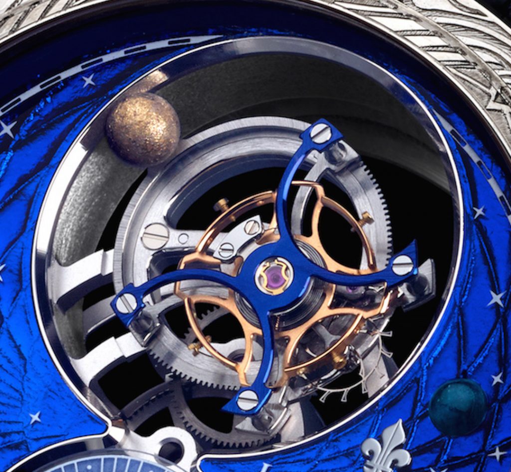 The over-sized tourbillon cage of the Louis Moinet Space Mystery watch is balanced by an orb that rotates around it, and the tourbillon also rotates. 