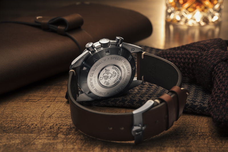 The Omega Speedy Tuesday Speedmaster watch features the Seahorse logo on the back. 
