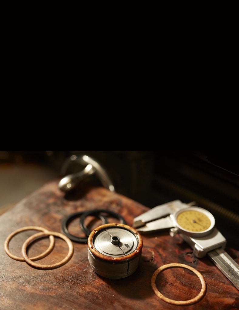 Surrounding the Ralph Lauren Automotive Skeleton 45mm Steel Bracelet watch is a “bombé”-shaped made of amboyna burl wood and reinforced with handset screws. 