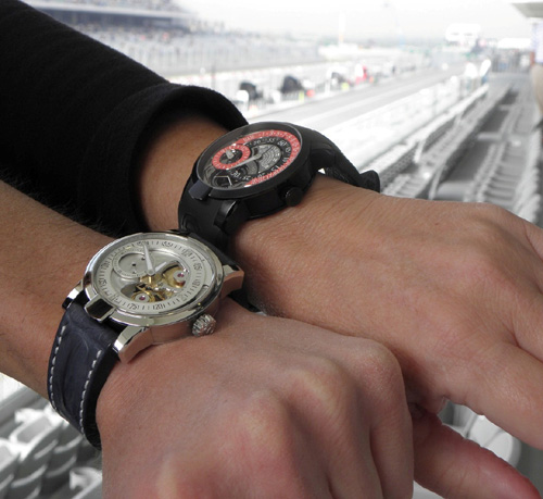 Armin Strom Racing Regulator and Manual watches on the wrist at the track. 