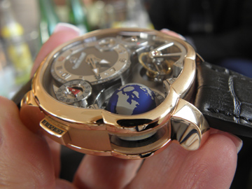 Side views of the Greubel Forsey GMT Asymetrique demonstrate its multi dimensions