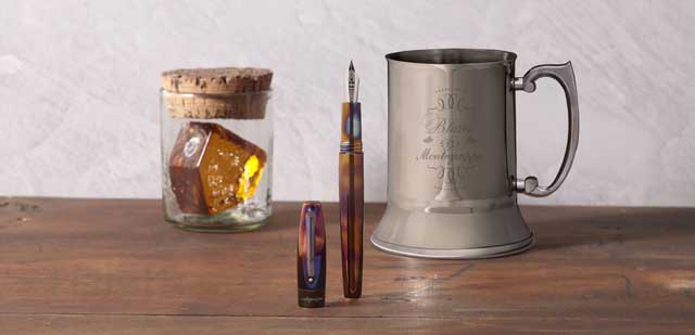 Montegrappa Fortuna Blue Blazer writing instrument is sold with a steel tankard used for making the fiery cocktail.