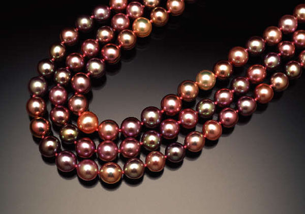 Rich brown and dark hues give these Chinese freshwater pearls even more allure. 
