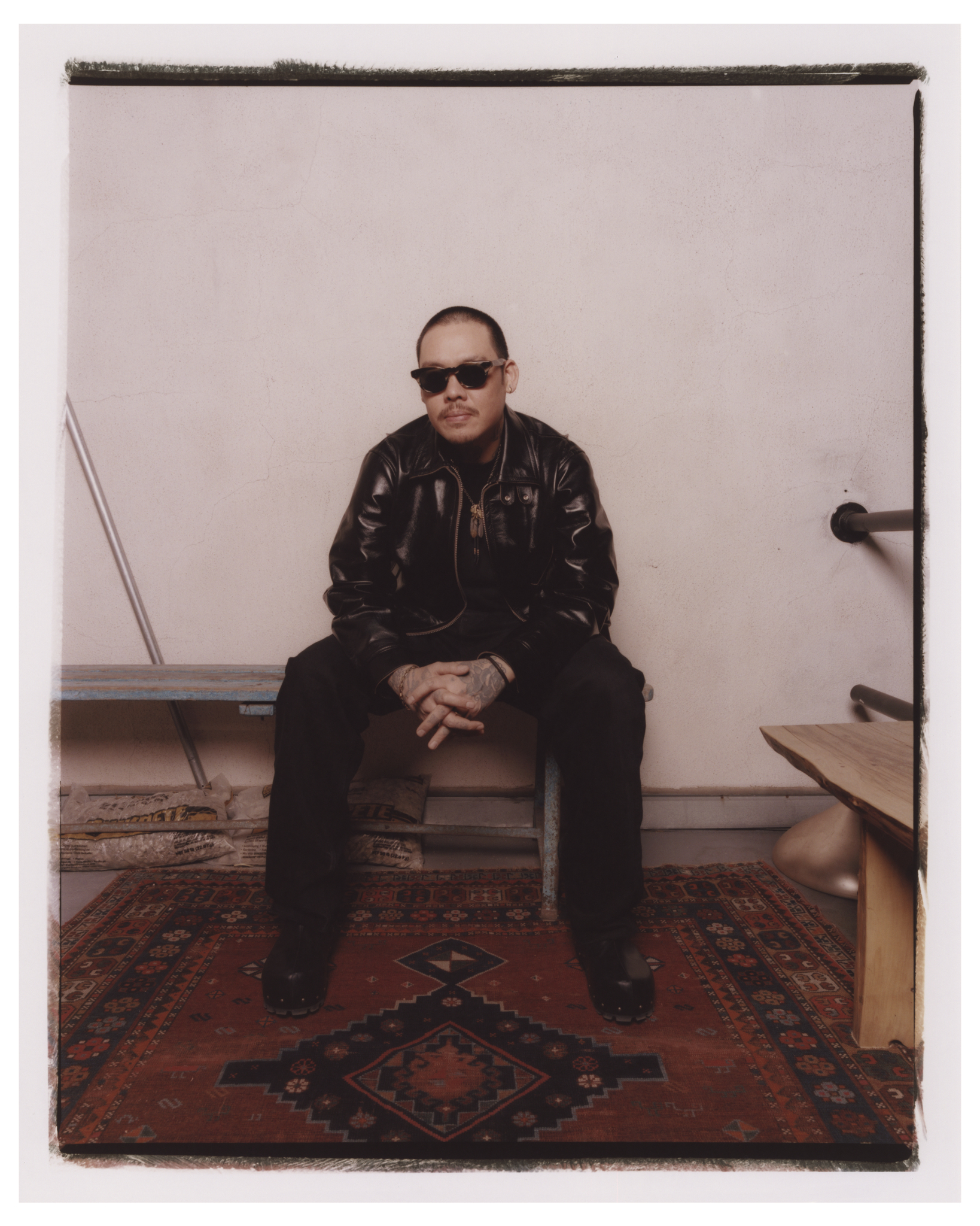 Designer and tattoo artist, Dr. Woo