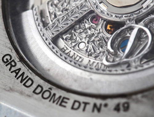 The movement of the Dubey & Schaldenbrand Grand Dome DT is intricately engraved and features the D logo prominantly. 