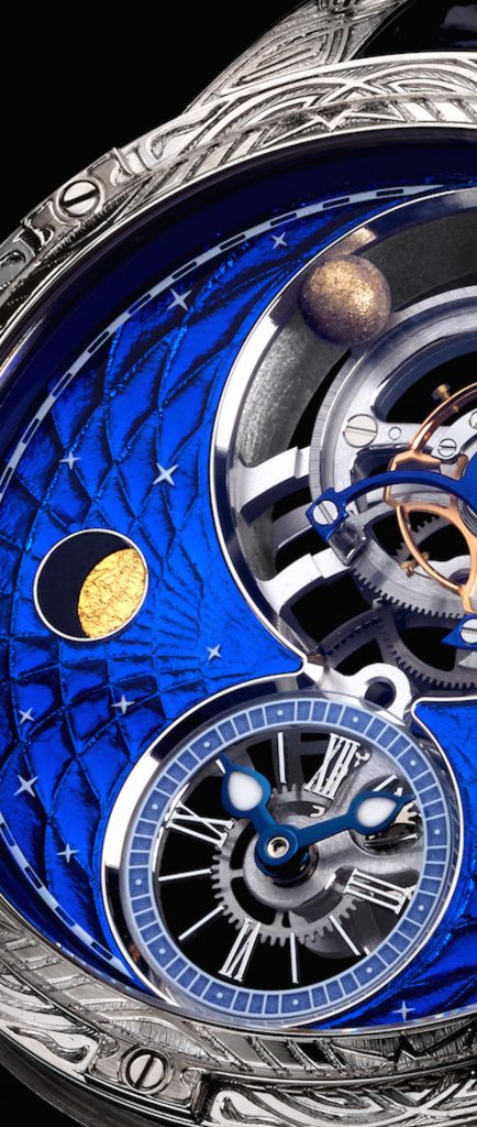 At 9:00 on the dial of the Louis Moinet Space Mystery watch, a tiny piece of meteorite containing amino acids is embedded. 