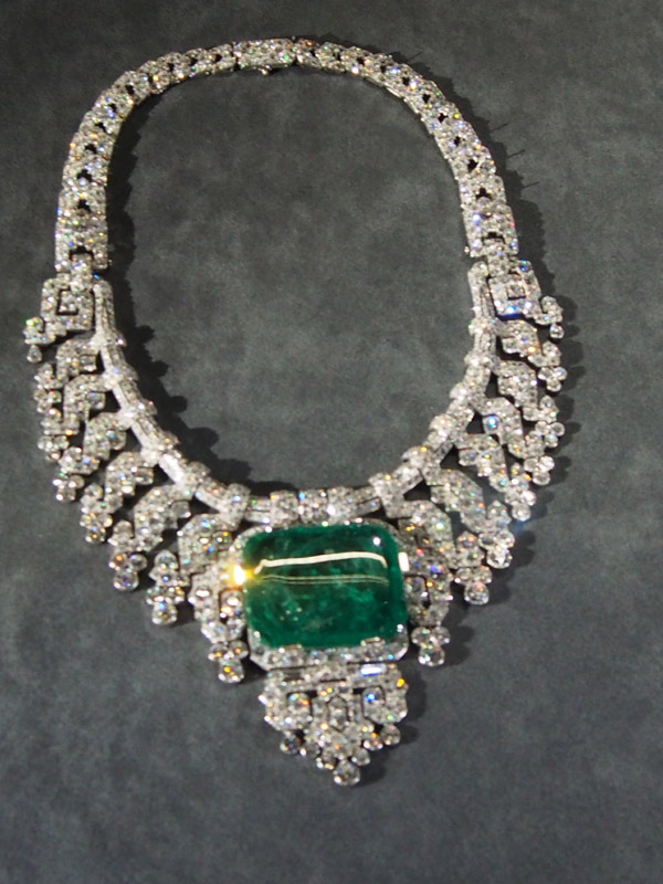 Platinum and diamond necklace with center emerald. Total 143.23 carats. Circa 1932.
